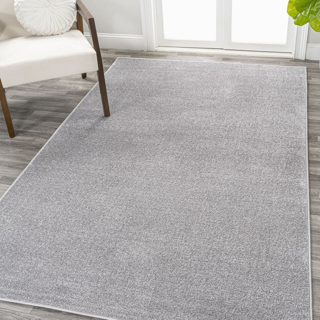 JONATHAN Y Tumbling Solid Low-Pile Area Rug