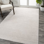JONATHAN Y Tumbling Solid Low-Pile Area Rug