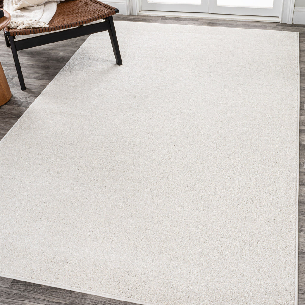 JONATHAN Y Tumbling Solid Low-Pile Area Rug