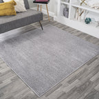 JONATHAN Y Tumbling Solid Low-Pile Area Rug