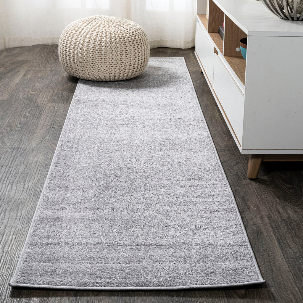 JONATHAN Y Tumbling Solid Low-Pile Area Rug