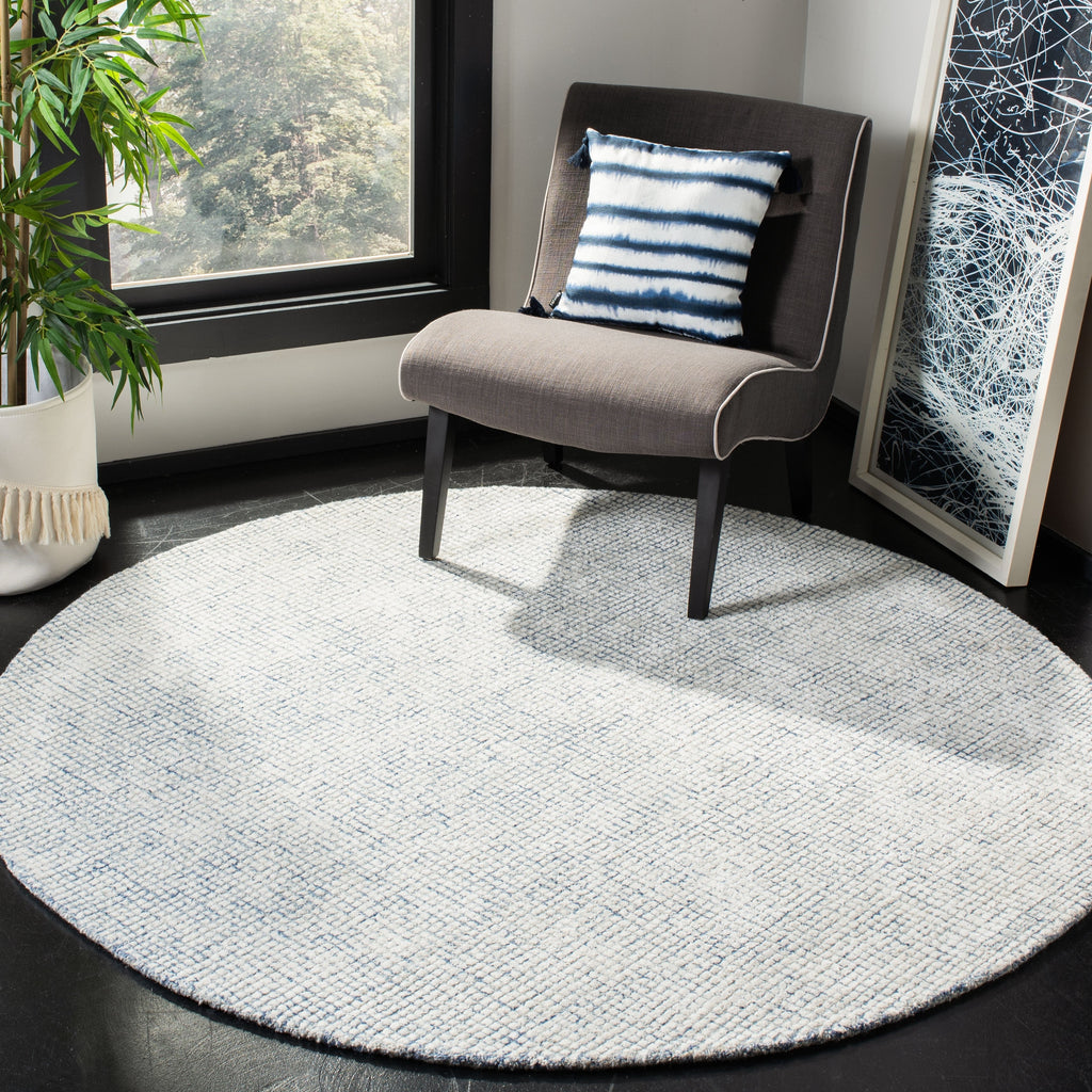 SAFAVIEH Handmade Abstract Marikka Modern Viscose Rug