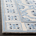 SAFAVIEH Handmade Bella Rodica Modern Floral Wool Rug