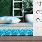 SAFAVIEH Handmade Braided Kita Country Rug