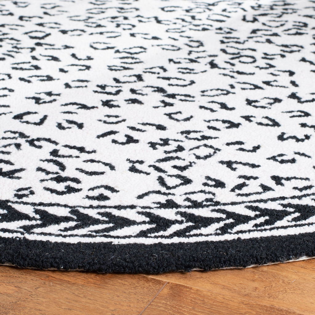 SAFAVIEH Handmade Chelsea Solar Garden Leopard French Country Wool Rug