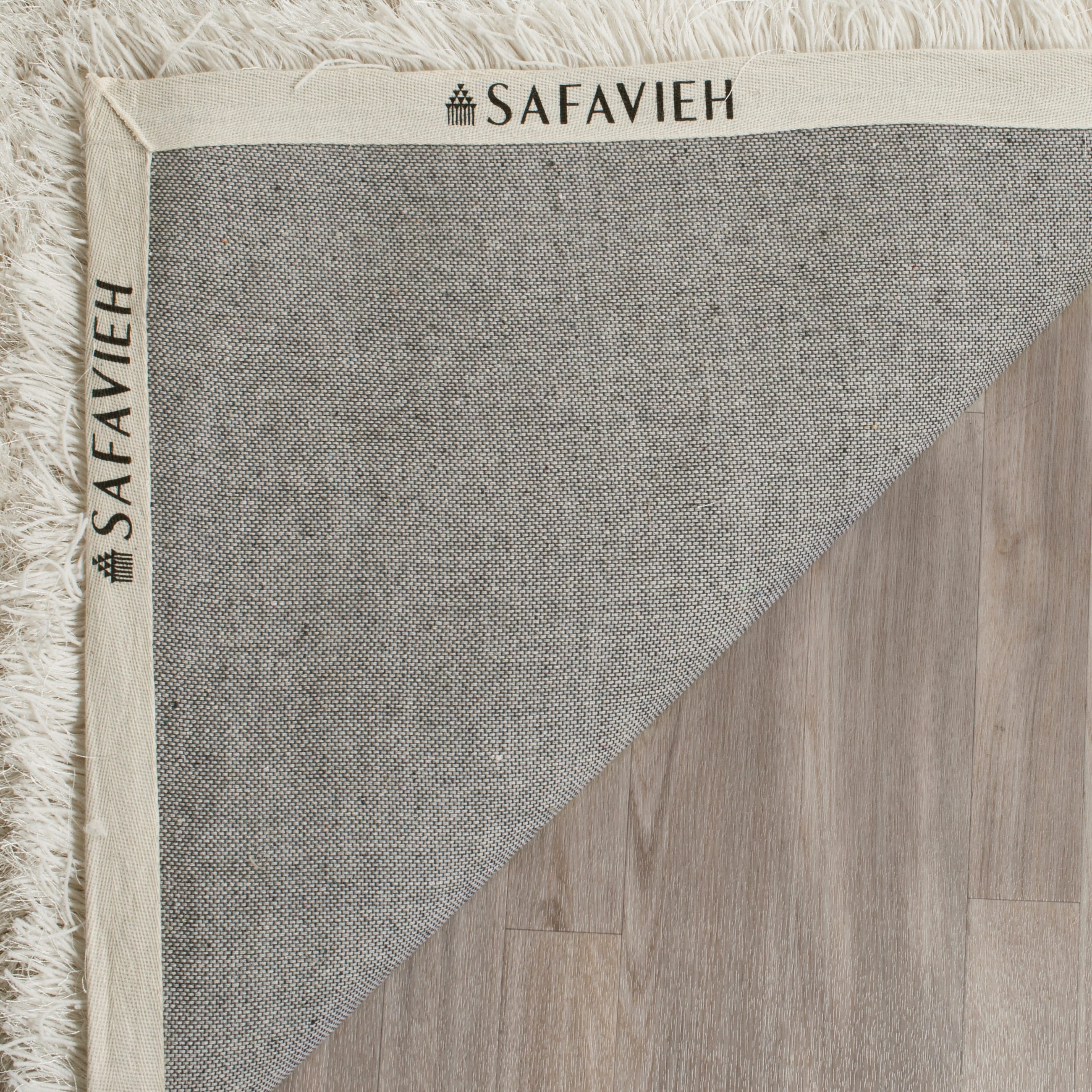 SAFAVIEH Handmade Fiona Shag Djenka 3-inch Thick Rug