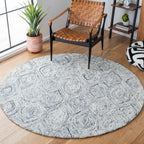 SAFAVIEH Handmade Ikat Lilija Wool Rug