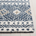SAFAVIEH Handmade Micro-Loop Lutetia Wool Rug
