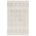 SAFAVIEH Handmade Micro-Loop Lutetia Wool Rug