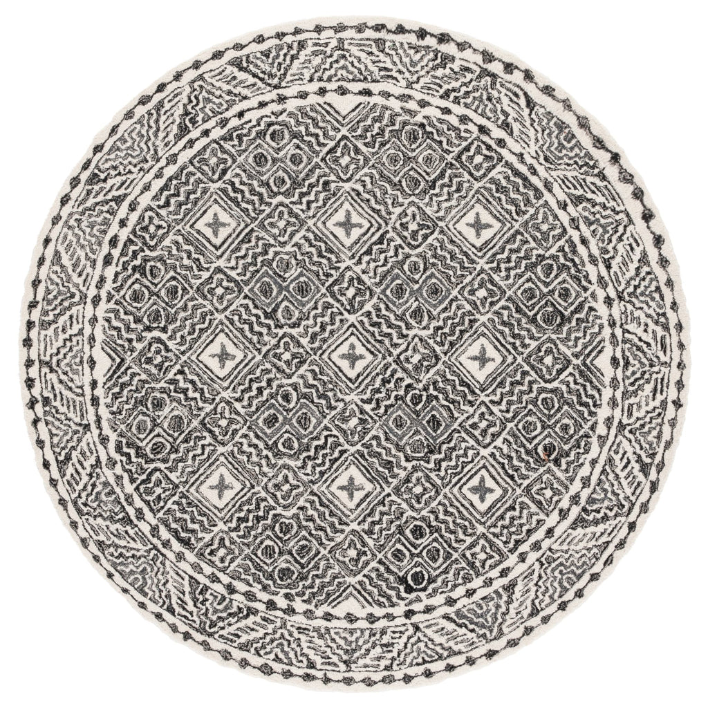 SAFAVIEH Handmade Micro-Loop Lutetia Wool Rug