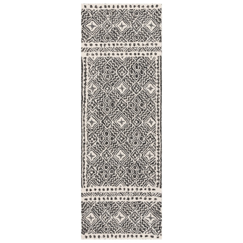 SAFAVIEH Handmade Micro-Loop Lutetia Wool Rug