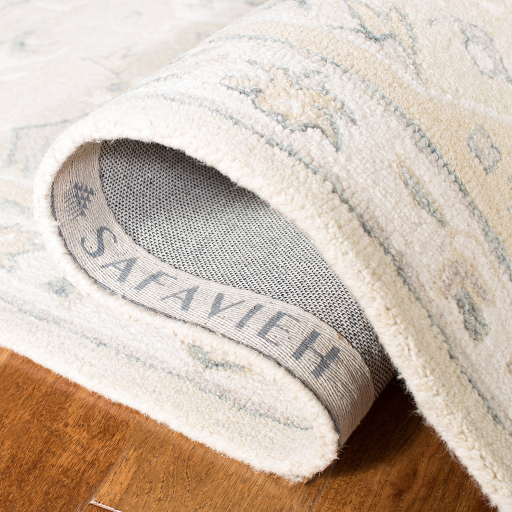 SAFAVIEH Handmade Micro-Loop Selveta Wool Rug