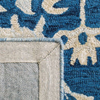 SAFAVIEH Handmade Micro-Loop Selveta Wool Rug