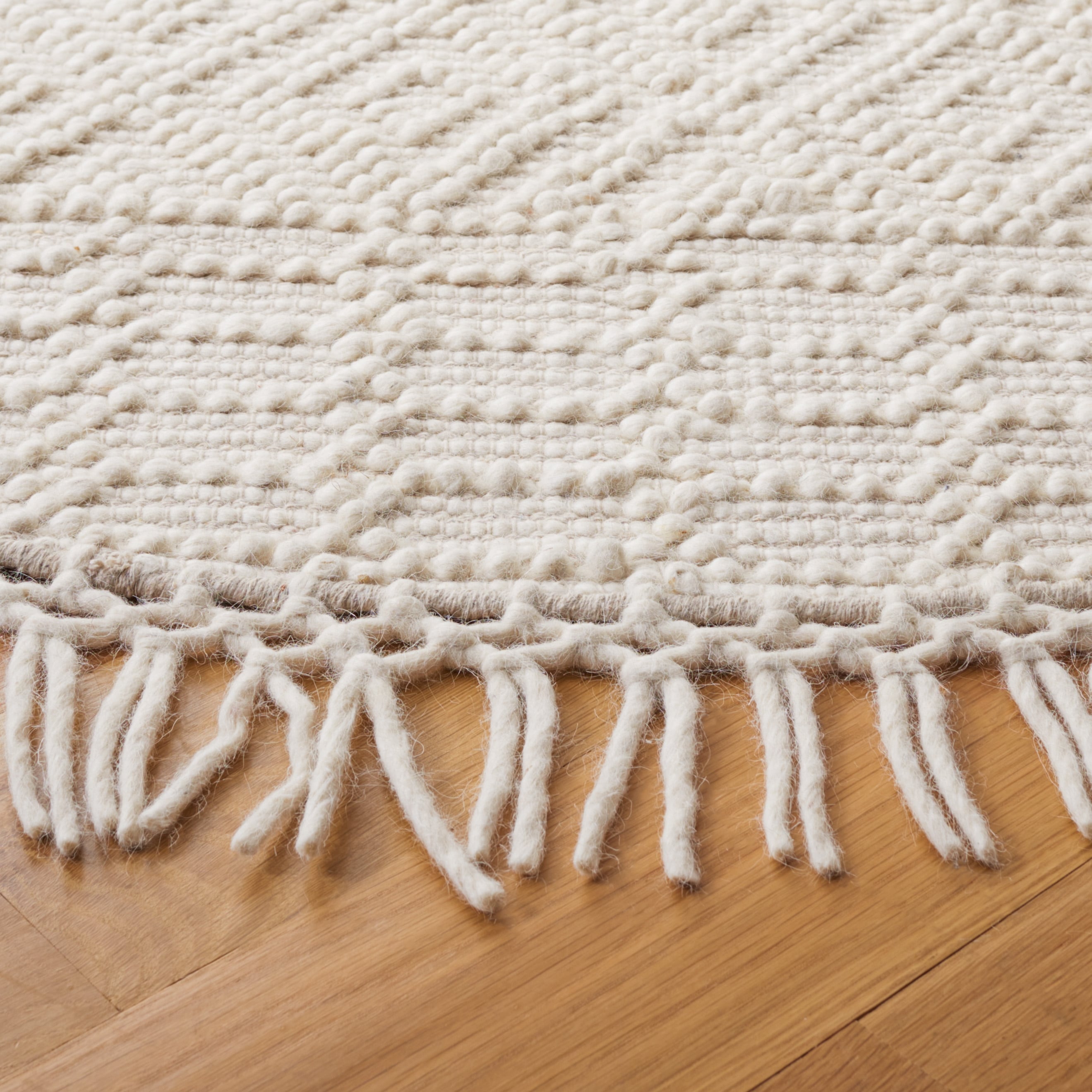 SAFAVIEH Handmade Natura Estel Wool Fringe Rug