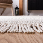 SAFAVIEH Handmade Natura Estel Wool Fringe Rug