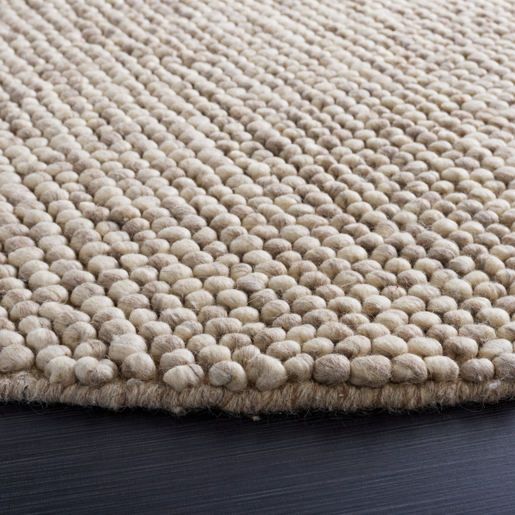 SAFAVIEH Handmade Natura Gonnie Wool Rug