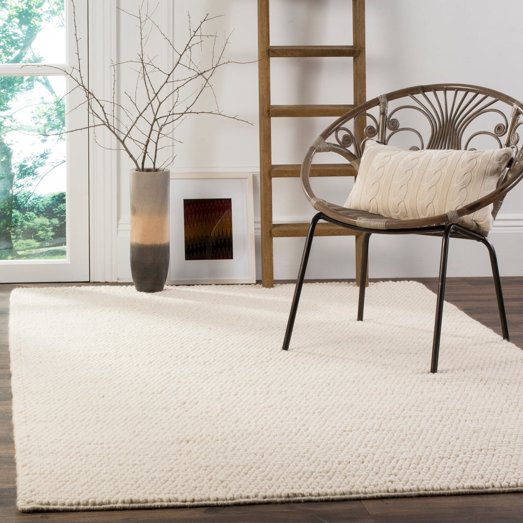 SAFAVIEH Handmade Natura Gonnie Wool Rug