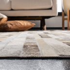 SAFAVIEH Handmade Studio Leather Tennille Modern Leather Rug
