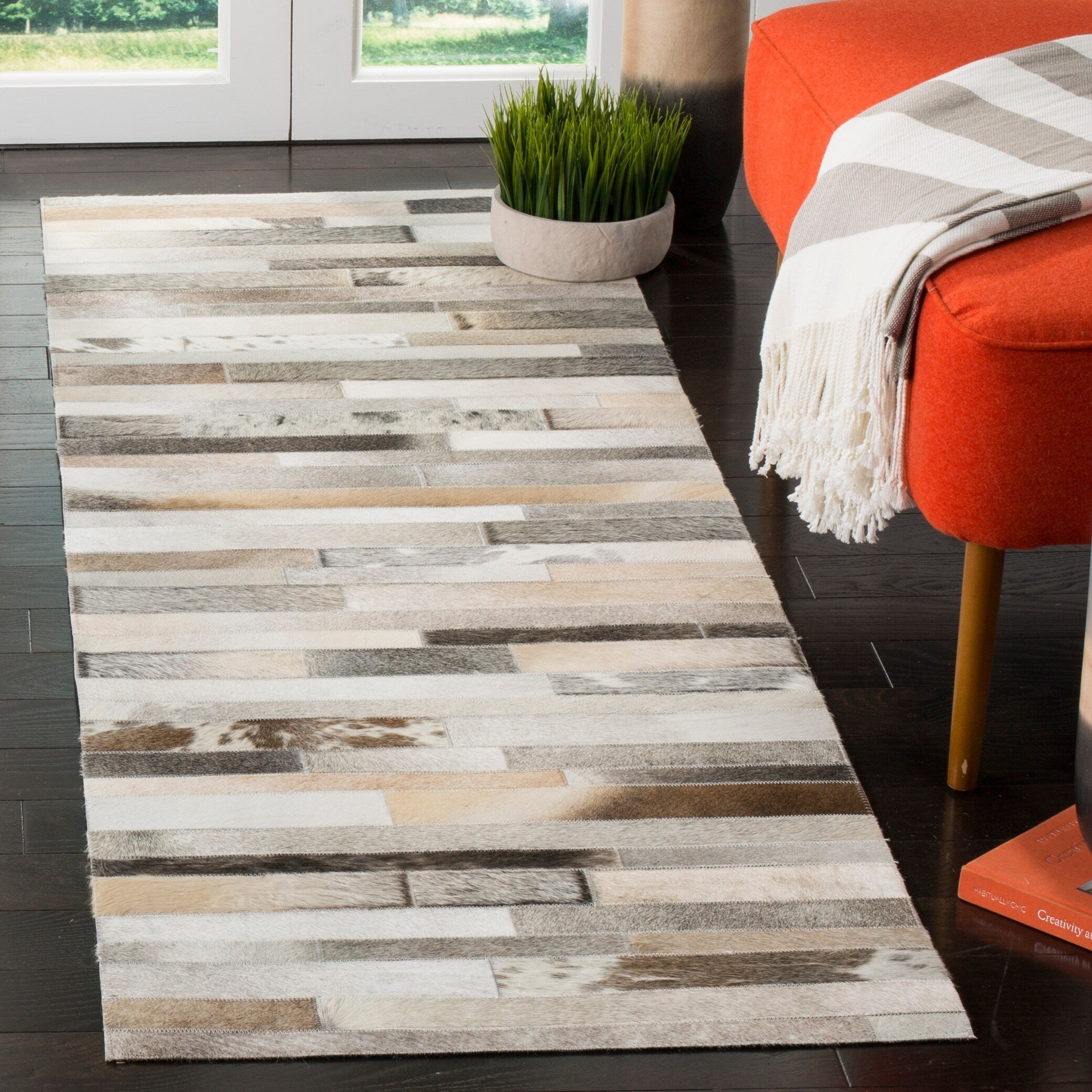 SAFAVIEH Handmade Studio Leather Tennille Modern Leather Rug