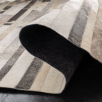 SAFAVIEH Handmade Studio Leather Tennille Modern Leather Rug