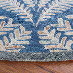SAFAVIEH Handmade Capri Kert Wool Rug