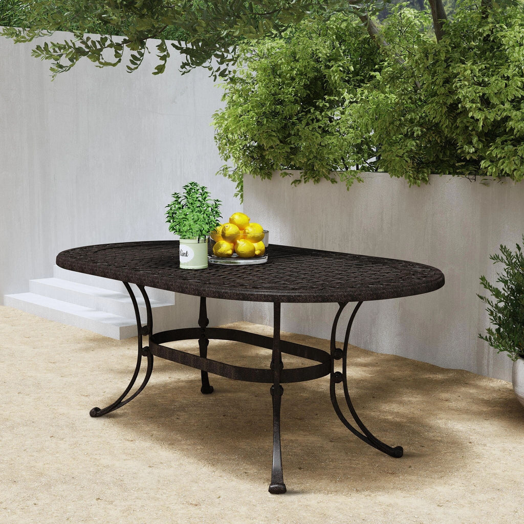 Sanibel Bronze Aluminum 7- Piece Outdoor Dining Set with 72 Oval Dining Table and Six Armchairs by Homestyles