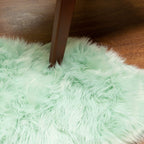 Silver Orchid Parrott Faux Fur Sheepskin Area Rug